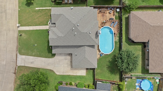 103 Daisey Ln, Justin, TX 76247 - drone / aerial view of a pool area