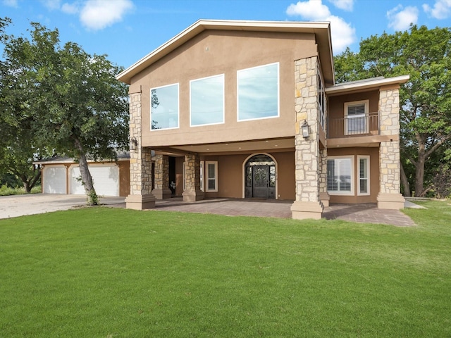 710 Crows Pt, Lake Bridgeport, TX 76426 - view of front of house with stucco siding, stone siding, and a front lawn