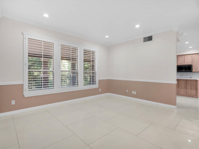 710 Crows Pt, Lake Bridgeport, TX 76426 - empty room featuring healthy amount of natural light, recessed lighting, baseboards, and light tile patterned floors