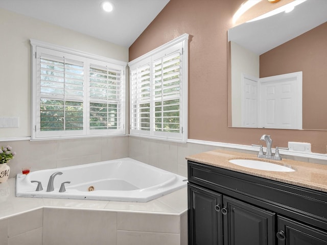710 Crows Pt, Lake Bridgeport, TX 76426 - bathroom featuring vanity and a tub with jets