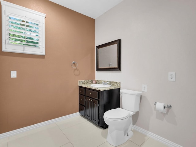 710 Crows Pt, Lake Bridgeport, TX 76426 - bathroom featuring toilet, baseboards, vanity, and tile patterned flooring