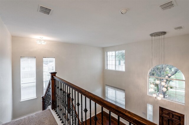 1531 Winding Trail Dr, Allen, TX 75002 - unfurnished room featuring dark wood finished floors, baseboards, and a chandelier