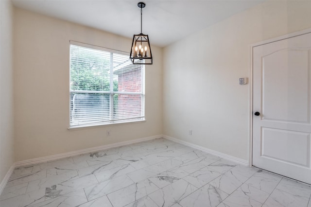 1531 Winding Trail Dr, Allen, TX 75002 - empty room featuring light marble finish flooring and a chandelier