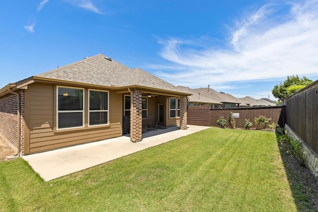 616 Forefront Ave, Celina, TX 75009 - back of property featuring brick siding, a patio area, and a shingled roof