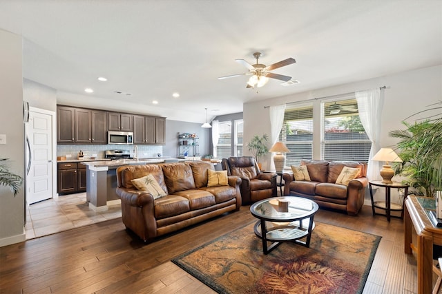 616 Forefront Ave, Celina, TX 75009 - living area featuring a ceiling fan, hardwood / wood-style floors, and recessed lighting