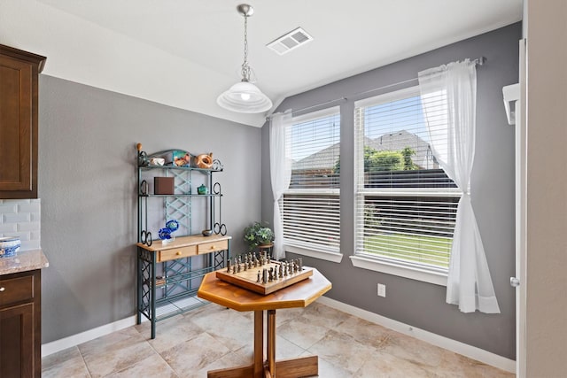 616 Forefront Ave, Celina, TX 75009 - dining area with lofted ceiling, baseboards, and light tile patterned floors