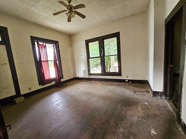823 W Louisiana St, Palestine, TX 75801 - spare room featuring hardwood / wood-style floors, plenty of natural light, and ceiling fan