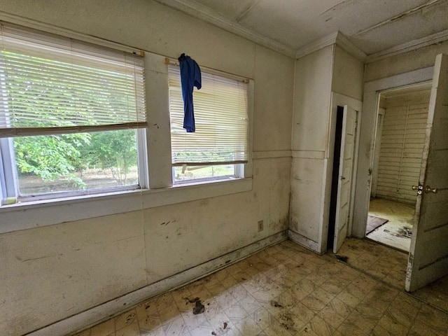823 W Louisiana St, Palestine, TX 75801 - unfurnished room featuring tile patterned floors and ornamental molding