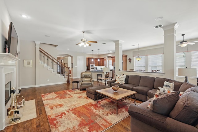 9352 Blanco Dr, Lantana, TX 76226 - living area featuring ceiling fan, decorative columns, dark wood-style floors, and recessed lighting