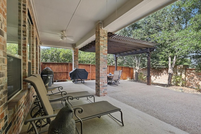 9352 Blanco Dr, Lantana, TX 76226 - fenced backyard with ceiling fan, outdoor dining space, a patio area, grilling area, and a pergola