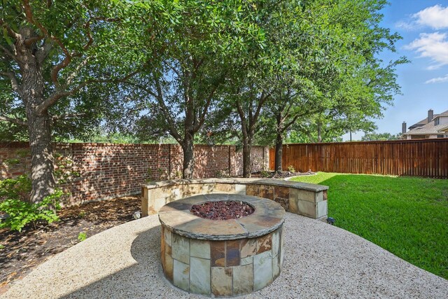 9352 Blanco Dr, Lantana, TX 76226 - view of patio featuring a fire pit