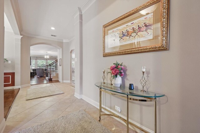 9352 Blanco Dr, Lantana, TX 76226 - corridor with arched walkways, ornamental molding, tile patterned flooring, baseboards, and recessed lighting
