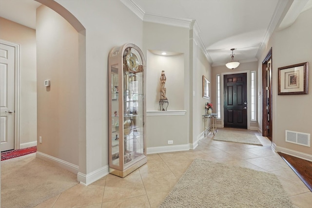 9352 Blanco Dr, Lantana, TX 76226 - tiled foyer entrance with ornamental molding, arched walkways, and baseboards