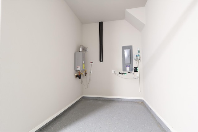 12978 Caprock Dr, Frisco, TX 75035 - garage with electric panel, tankless water heater, and baseboards