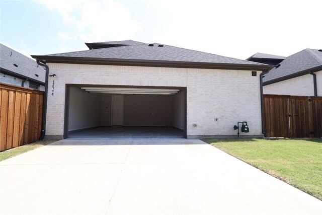 12978 Caprock Dr, Frisco, TX 75035 - view of side of property with brick siding, concrete driveway, and an attached garage