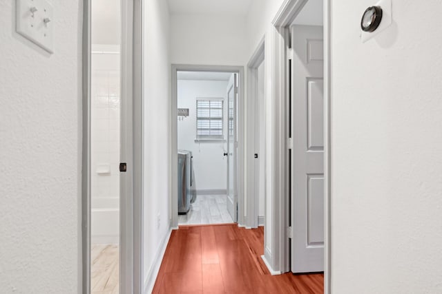 921 Stoneway Dr, Denton, TX 76210 - hallway with wood finished floors and baseboards