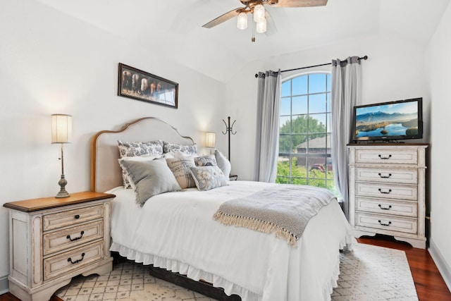 921 Stoneway Dr, Denton, TX 76210 - bedroom featuring vaulted ceiling, wood finished floors, and a ceiling fan