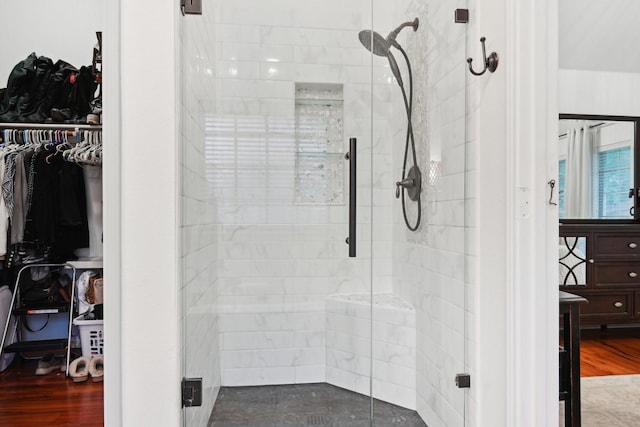 921 Stoneway Dr, Denton, TX 76210 - full bathroom featuring a stall shower and a spacious closet