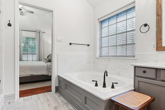 921 Stoneway Dr, Denton, TX 76210 - full bath with a bath, vanity, and connected bathroom