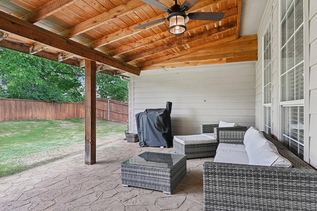 921 Stoneway Dr, Denton, TX 76210 - fenced backyard with an outdoor living space, a patio, and a ceiling fan
