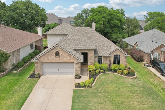 921 Stoneway Dr, Denton, TX 76210 - view of front of house featuring brick siding, concrete driveway, a garage, a shingled roof, and a front yard