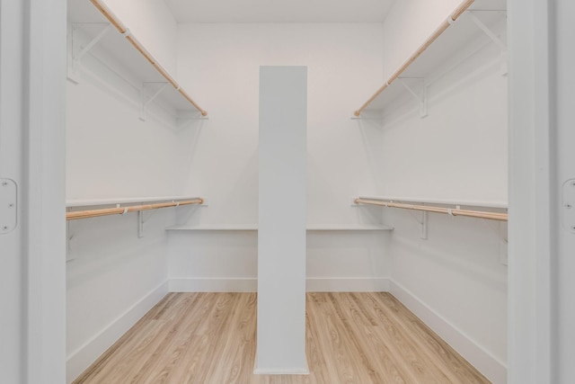 821 Hearthside Way, Mckinney, TX 75071 - spacious closet with wood finished floors