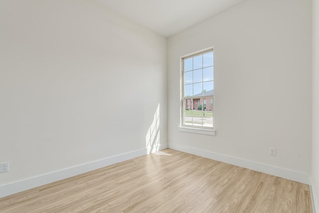 821 Hearthside Way, Mckinney, TX 75071 - unfurnished room featuring light wood-style floors and baseboards