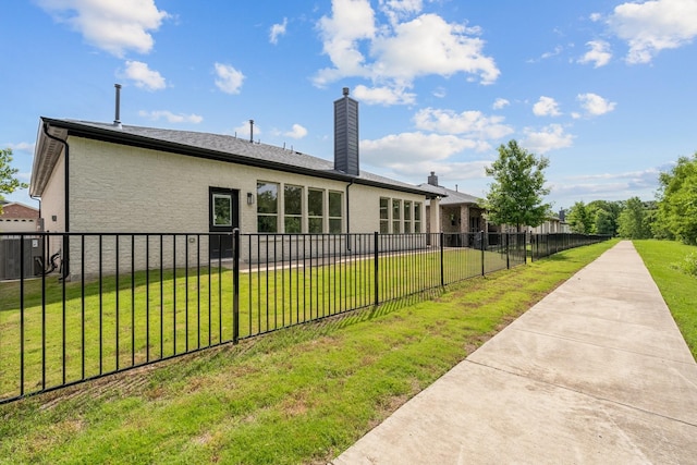 821 Hearthside Way, Mckinney, TX 75071 - back of property featuring a chimney and brick siding