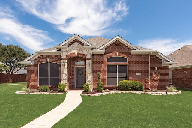 5536 Green Hollow Ln, The Colony, TX 75056 - view of front of property with brick siding, a shingled roof, and stone siding