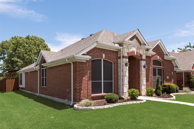 5536 Green Hollow Ln, The Colony, TX 75056 - view of side of property featuring brick siding and roof with shingles