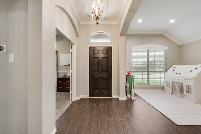 5536 Green Hollow Ln, The Colony, TX 75056 - entryway featuring ornamental molding, baseboards, a chandelier, dark wood-style floors, and recessed lighting