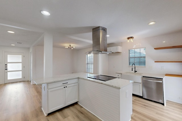 1426 S Beckley Ave, Dallas, TX 75224 - kitchen with island range hood, stainless steel dishwasher, black electric cooktop, a sink, and light wood finished floors