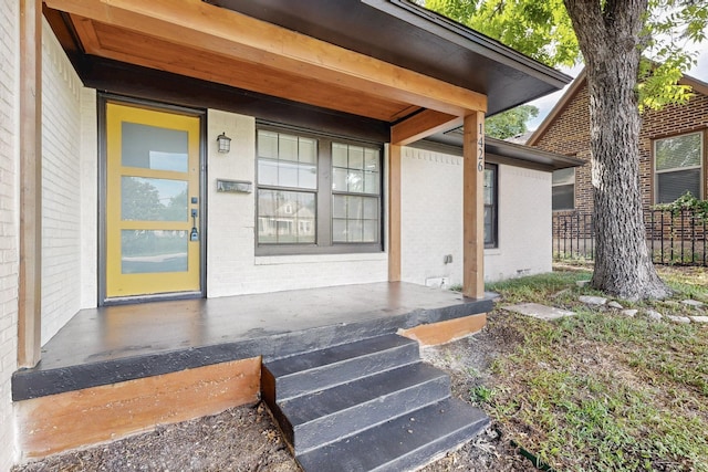 1426 S Beckley Ave, Dallas, TX 75224 - entrance to property featuring brick siding and a porch