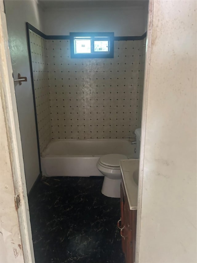 1413 E 8th Ave, Corsicana, TX 75110 - full bath featuring vanity, toilet, and bathing tub / shower combination