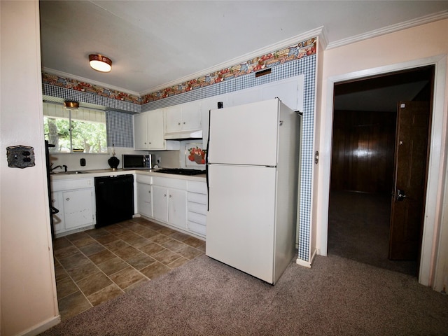 1431 Brazos St, Graham, TX 76450 - kitchen with black appliances, crown molding, under cabinet range hood, white cabinetry, and dark carpet