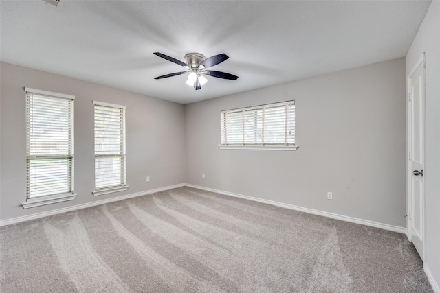 15820 Meadow Vista Dr, Dallas, TX 75248 - empty room with a ceiling fan, carpet flooring, and baseboards