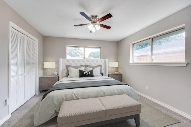 15820 Meadow Vista Dr, Dallas, TX 75248 - carpeted bedroom featuring baseboards, a closet, and a ceiling fan