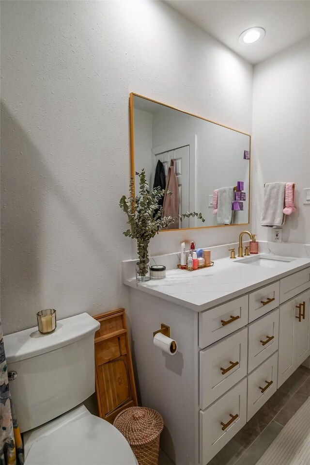 3311 Blackburn St Unit 115, Dallas, TX 75204 - bathroom with toilet and vanity