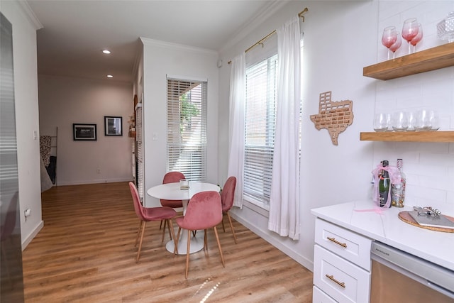 3311 Blackburn St Unit 115, Dallas, TX 75204 - dining area featuring ornamental molding, light wood finished floors, baseboards, and recessed lighting