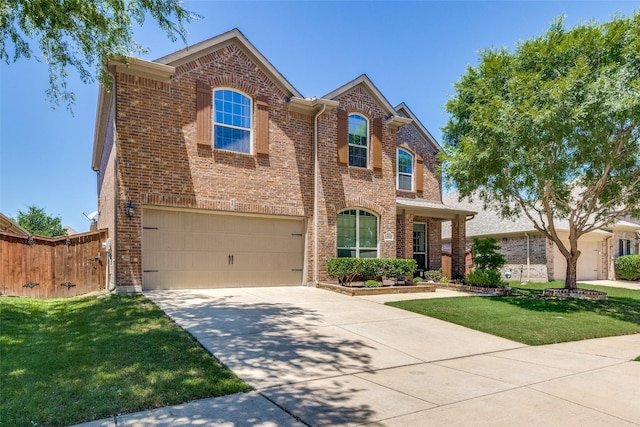 1386 Caspian Dr, Roanoke, TX 76262 - traditional-style house featuring brick siding, driveway, a garage, and a gate