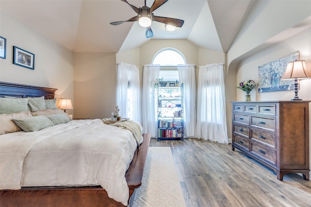 1386 Caspian Dr, Roanoke, TX 76262 - bedroom featuring light wood-style flooring, lofted ceiling, and ceiling fan