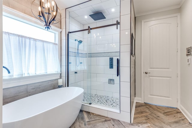 1386 Caspian Dr, Roanoke, TX 76262 - full bathroom featuring a chandelier, a stall shower, a freestanding tub, baseboards, and recessed lighting