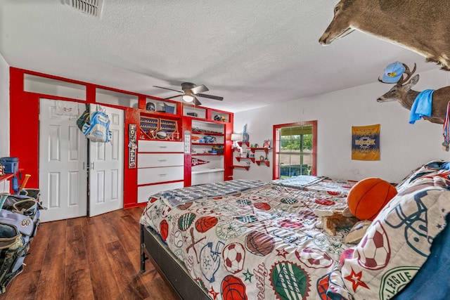40248 Fm 2481, Hico, TX 76457 - bedroom with wood finished floors, a textured ceiling, and ceiling fan