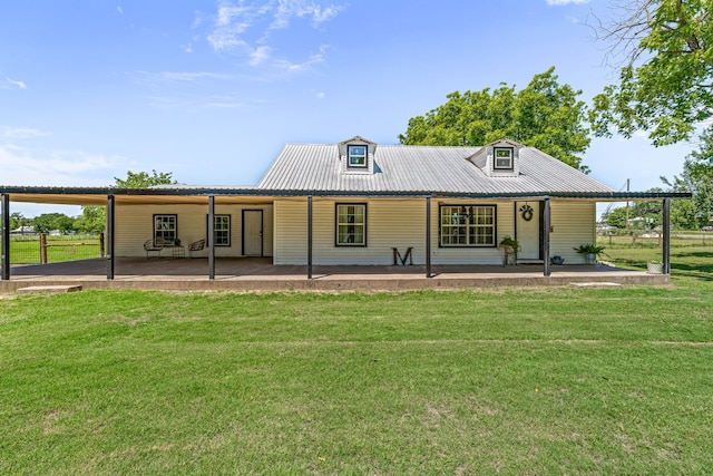 40248 Fm 2481, Hico, TX 76457 - back of house with a yard, metal roof, and covered porch