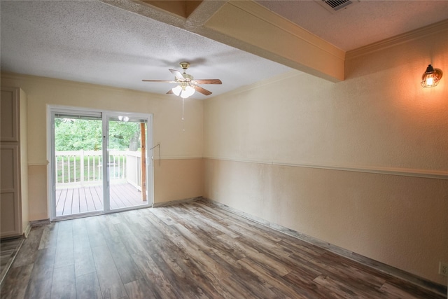 107 Clover Dr, Gun Barrel City, TX 75156 - unfurnished room with a ceiling fan, wood finished floors, a textured wall, a textured ceiling, and crown molding