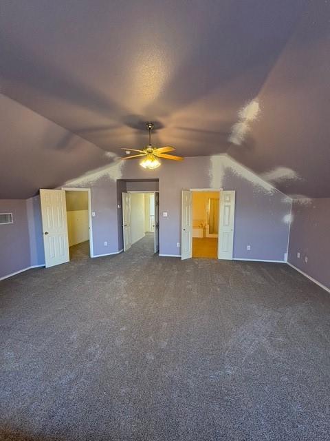 5421 Palace Dr, Richardson, TX 75082 - bonus room with vaulted ceiling, carpet flooring, a ceiling fan, and baseboards