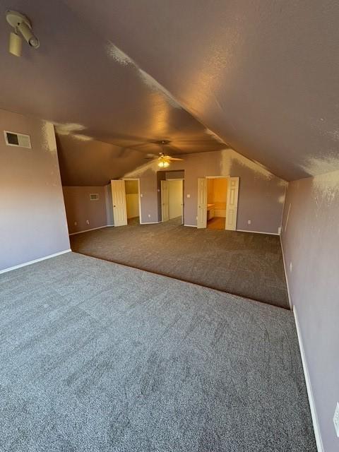 5421 Palace Dr, Richardson, TX 75082 - additional living space featuring carpet floors, lofted ceiling, ceiling fan, and baseboards