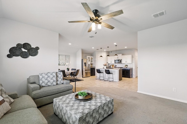 3800 Canyon Verde Ln, Denton, TX 76226 - living room featuring a ceiling fan, recessed lighting, baseboards, light carpet, and light tile patterned floors