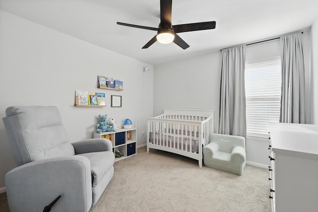 3800 Canyon Verde Ln, Denton, TX 76226 - bedroom with carpet flooring, a nursery area, baseboards, and ceiling fan
