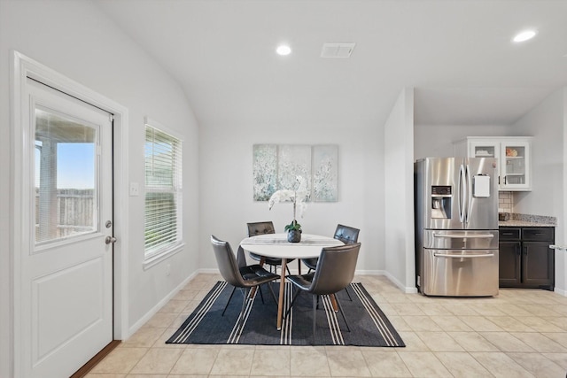3800 Canyon Verde Ln, Denton, TX 76226 - dining room with light tile patterned floors, recessed lighting, baseboards, and vaulted ceiling